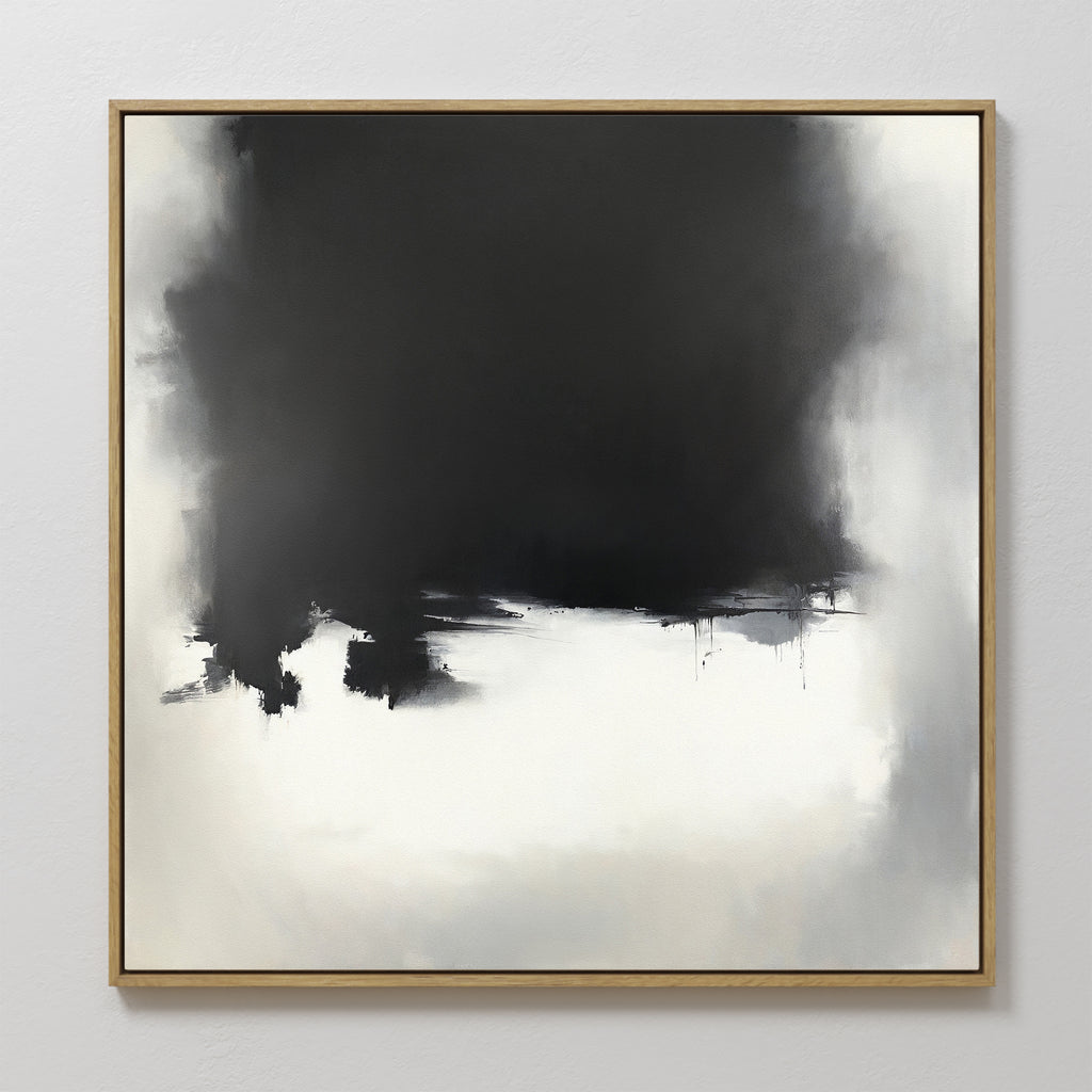 Ink Cloud Formation Canvas Art - Square features a bold black section merging into soft gray and white, creating a misty, cloud-like effect. This monochrome print with a gold frame adds modern sophistication to any space.