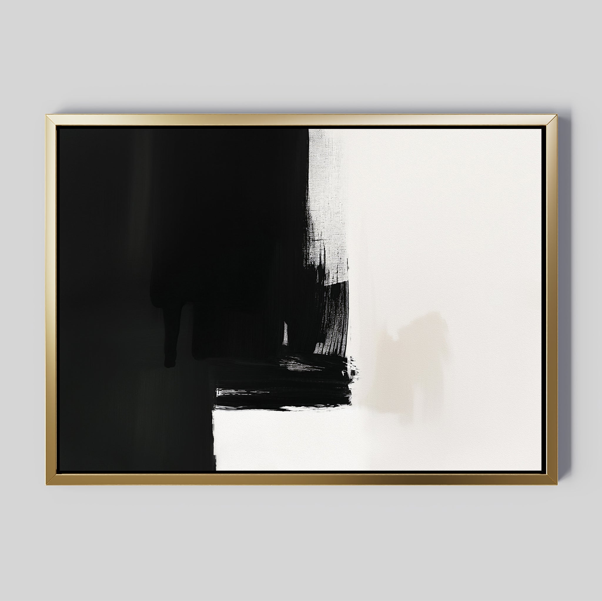 Ink Divide Canvas Art - Horizontal features bold black brushstrokes blending into white on a light gray background, framed in gold. Its minimalistic design adds modern elegance and striking contrast to any space as standout wall art.