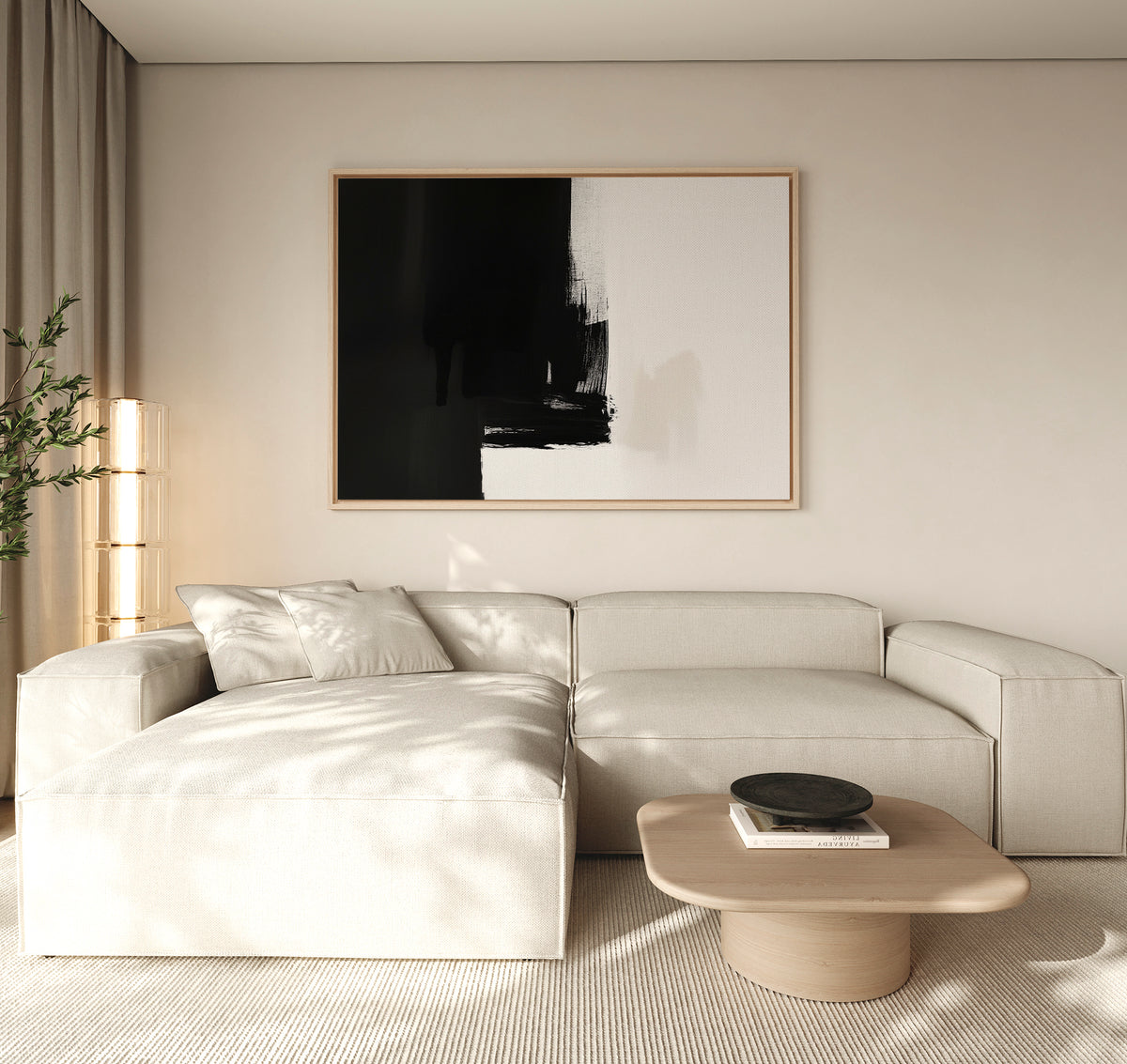 A modern living room features a light beige sectional, a low wooden coffee table, a black bowl, a tall corner plant, and the Ink Divide Canvas Art - Horizontal—a large abstract piece—adding contemporary elegance to the space.