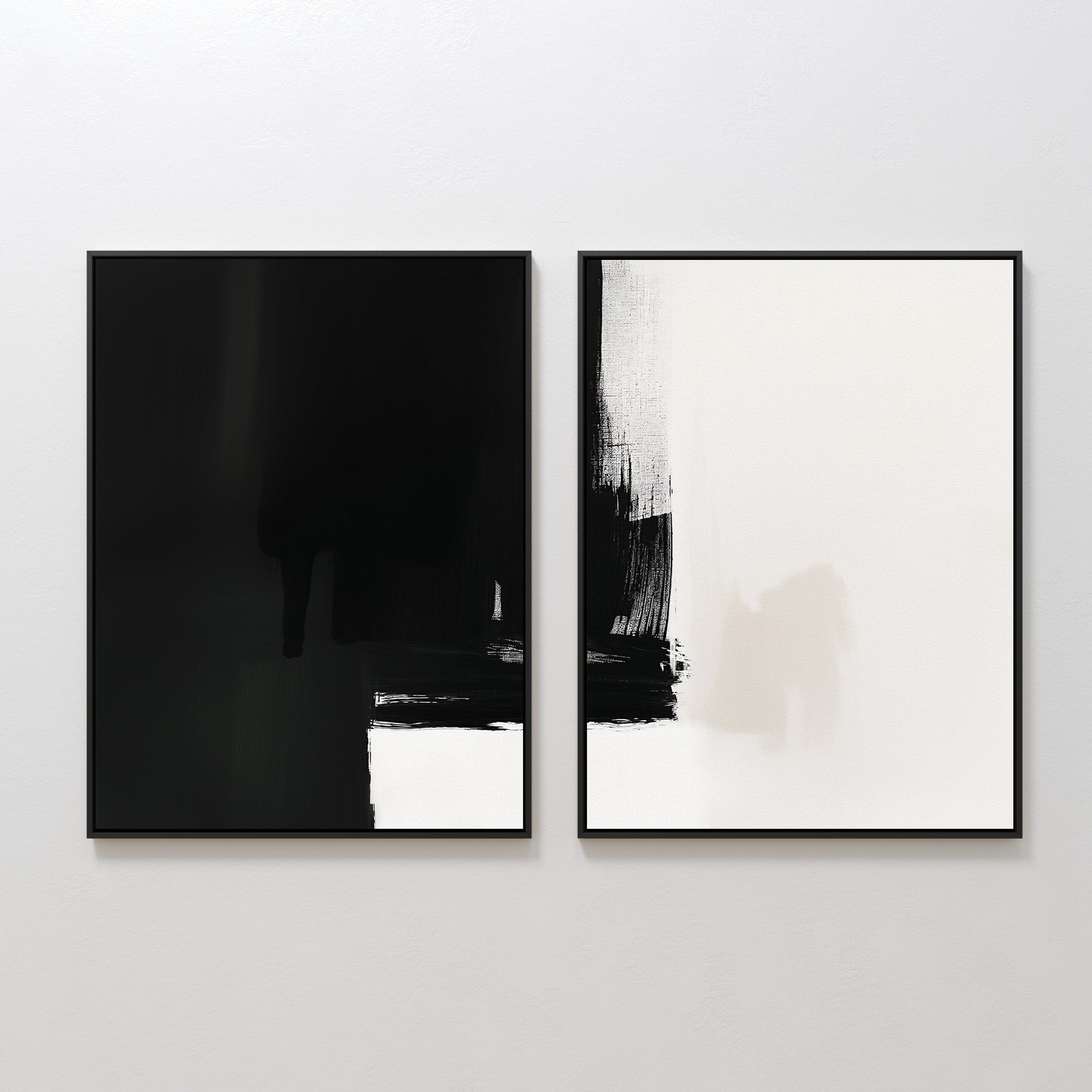 The Ink Divide - Set Of 2 features side-by-side abstract prints: the left one is mostly black with a white base, and the right displays bold black brushstrokes on white—modern minimalist wall art ideal for any space.