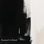 A close-up of the Ink Divide Canvas Art - Square reveals black paintbrush strokes on white canvas with textured bristle details—ideal for minimalist art lovers. “Zoomed In Detail” is shown in the bottom left corner.