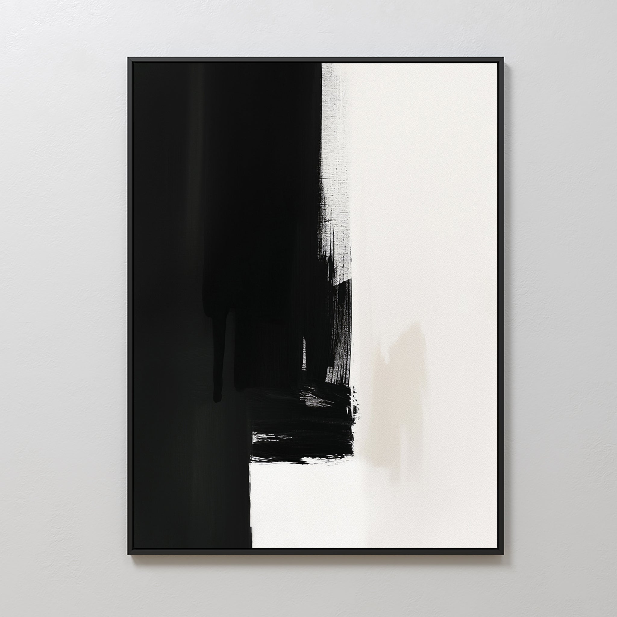 The Ink Divide Canvas Art - Vertical features bold black brushstrokes on the left fading into white on the right, creating a striking contrast and embodying minimalist, modern wall art.