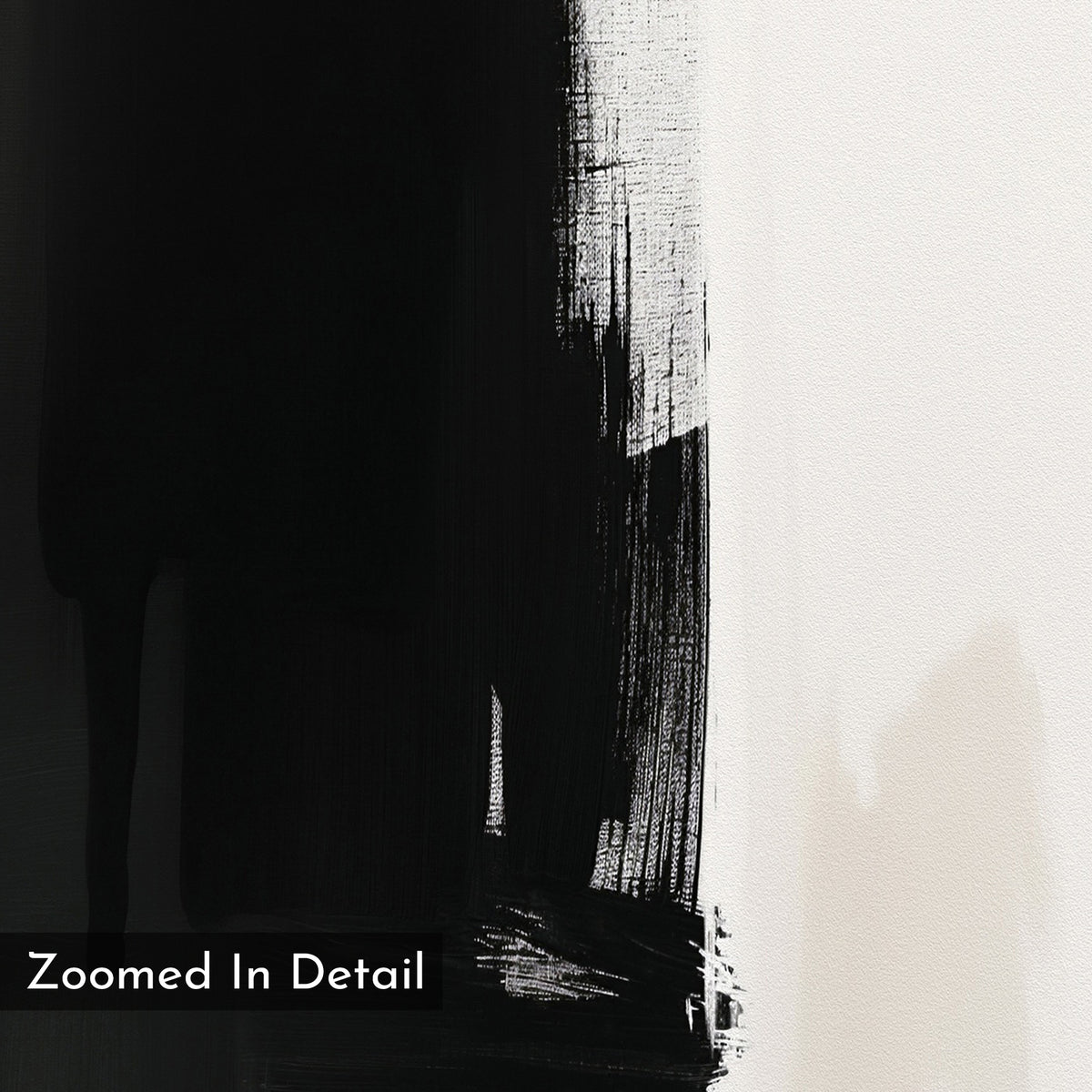 A close-up of Ink Divide Canvas Art - Vertical reveals a textured black brushstroke on white canvas. The left is mostly black, the right is white—ideal for adding modern elegance. “Zoomed In Detail” appears at the bottom left corner.