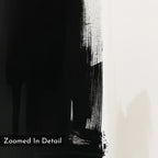 A close-up of Ink Divide Canvas Art - Vertical reveals a textured black brushstroke on white canvas. The left is mostly black, the right is white—ideal for adding modern elegance. “Zoomed In Detail” appears at the bottom left corner.