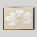 The Ivory Bloom Canvas Art - Horizontal features a single white flower with six large petals on a beige background, set in a thin gold frame—ideal neutral wall decor or botanical wall art for any space.
