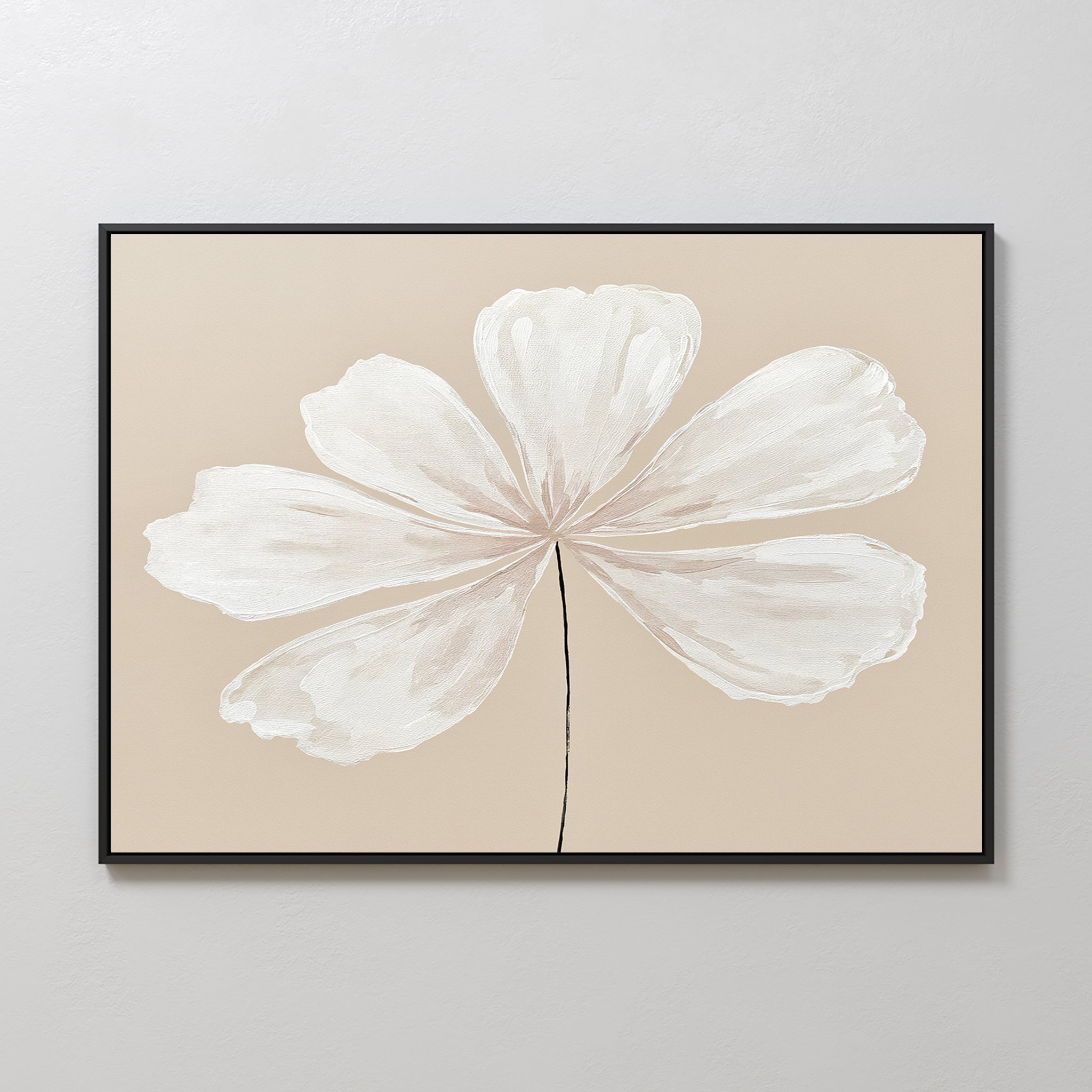 Ivory Bloom Canvas Art - Horizontal: A minimalist print of a large six-petaled white flower with a black stem on beige, framed in black. Ideal neutral wall decor for light-colored spaces.