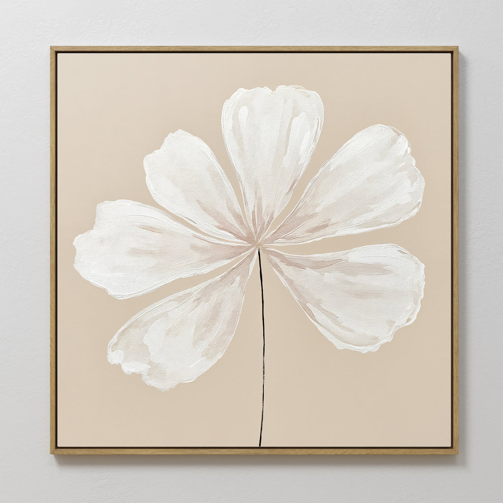 The Ivory Bloom Canvas Art - Square showcases a white six-petaled flower with a black stem on a beige background, framed in thin wood—ideal minimalist botanical wall art for neutral home decor.