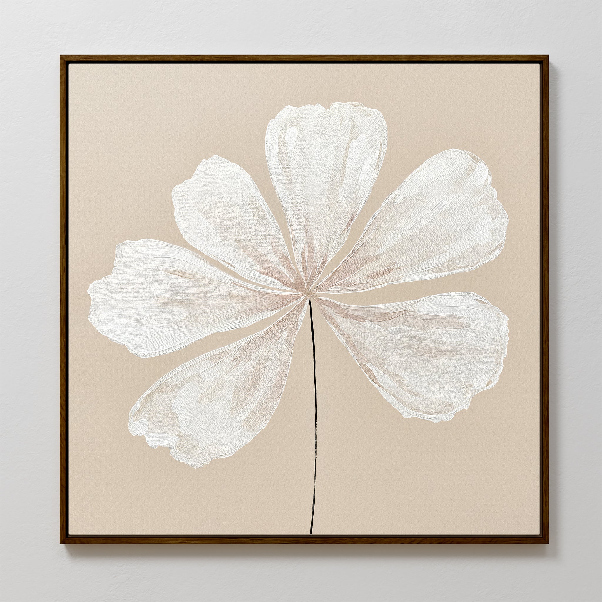 The Ivory Bloom Canvas Art - Square features a minimalist white abstract seven-petal flower with a thin black stem on a light beige background, framed in dark wood—ideal botanical wall art for neutral home decor.