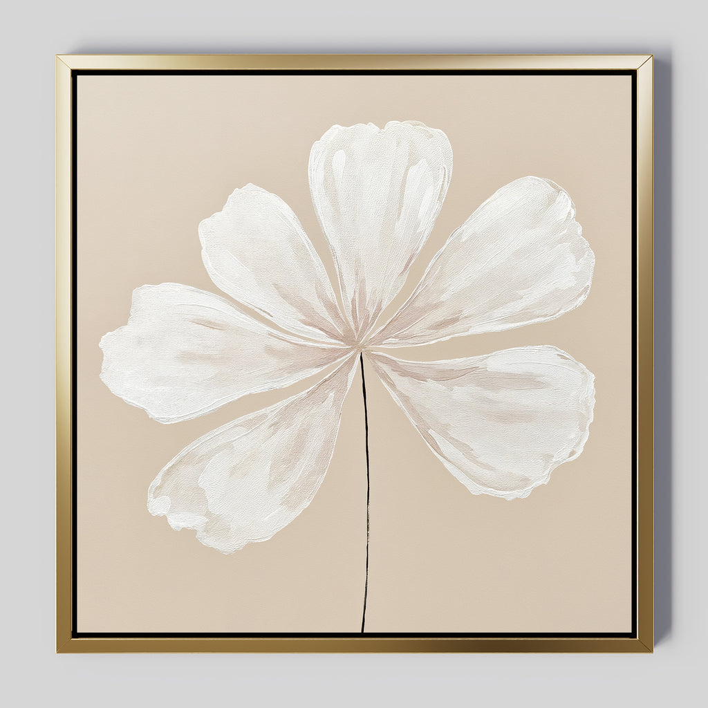 The Ivory Bloom Canvas Art - Square showcases a large, pale white eight-petal flower with a thin black stem on a light beige background, elegantly framed in gold and black—ideal botanical wall art for neutral home decor.