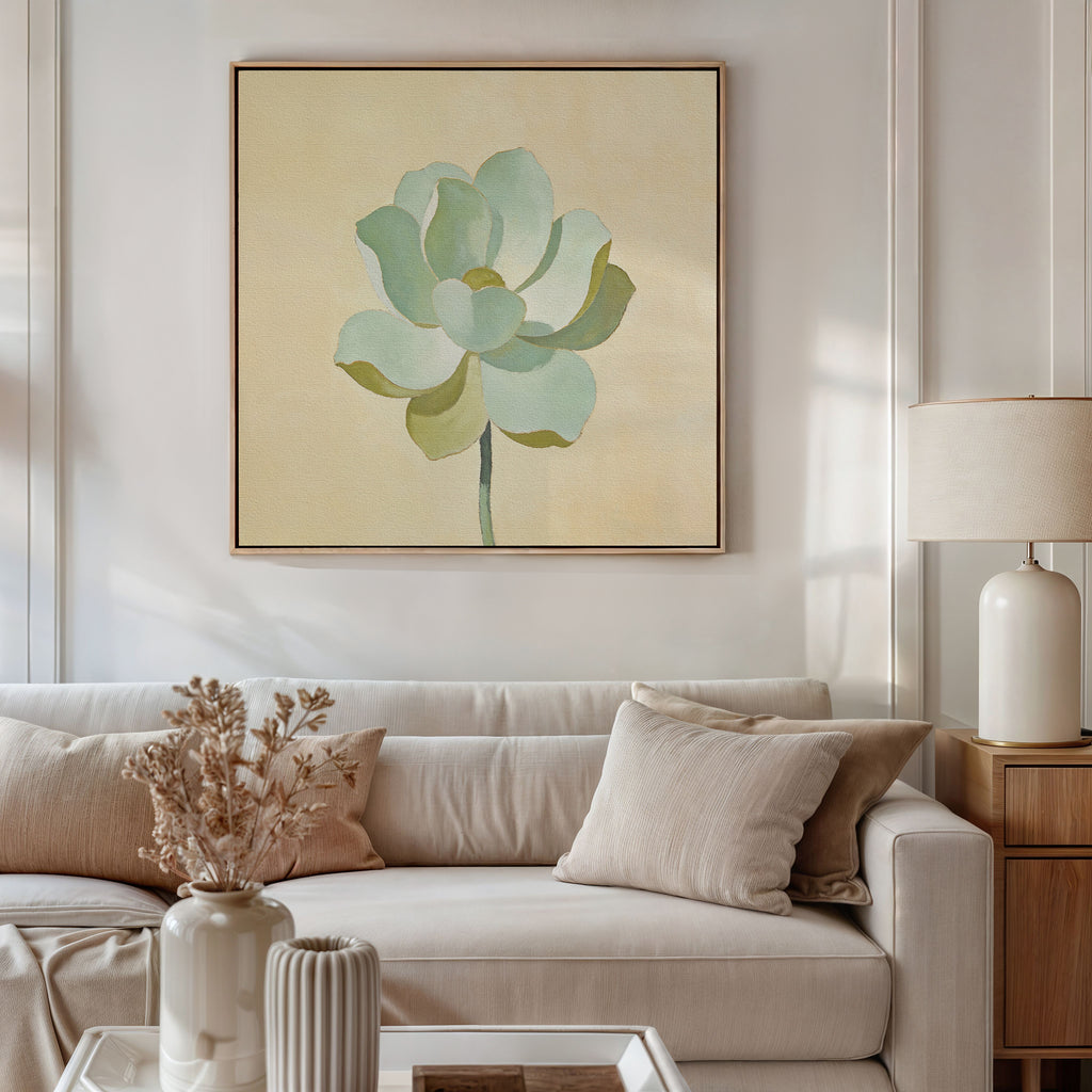 A modern living room features a beige sofa with neutral pillows, a side table with a white lamp, and the Jade Reflection Canvas Art - Square as minimalist wall art. A vase of dried flowers on the coffee table adds Nordic Park charm.