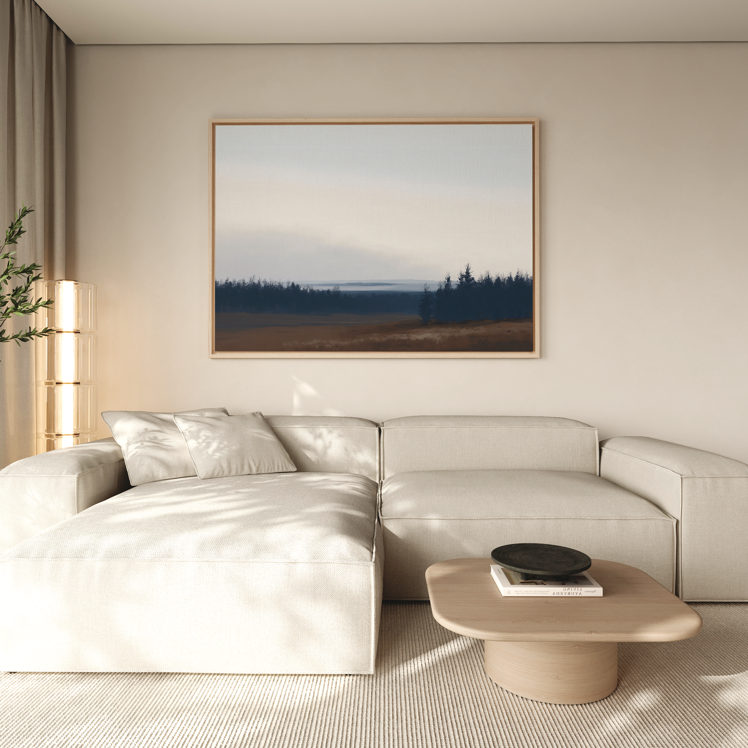 A modern living room features a light beige sectional sofa, a wooden coffee table with a black bowl, and Northern Woods Canvas Art on a neutral wall. Natural light from the left enhances the airy, serene atmosphere.