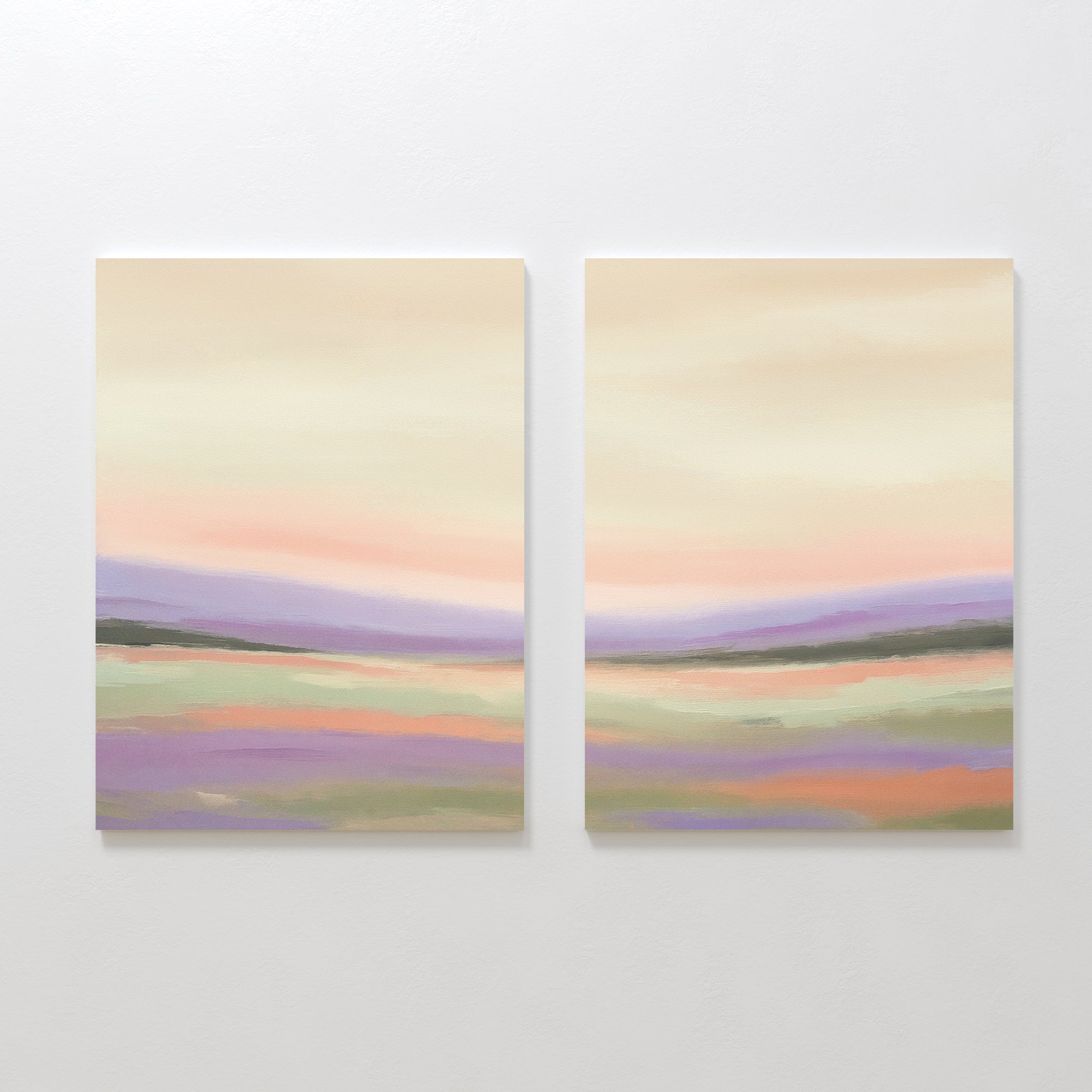 The Lavender Valley - Set Of 2 features side-by-side canvas paintings with soft pastel pink, purple, green, and beige tones, depicting an abstract landscape that brings a serene Nordic Park vibe to your wall decor.