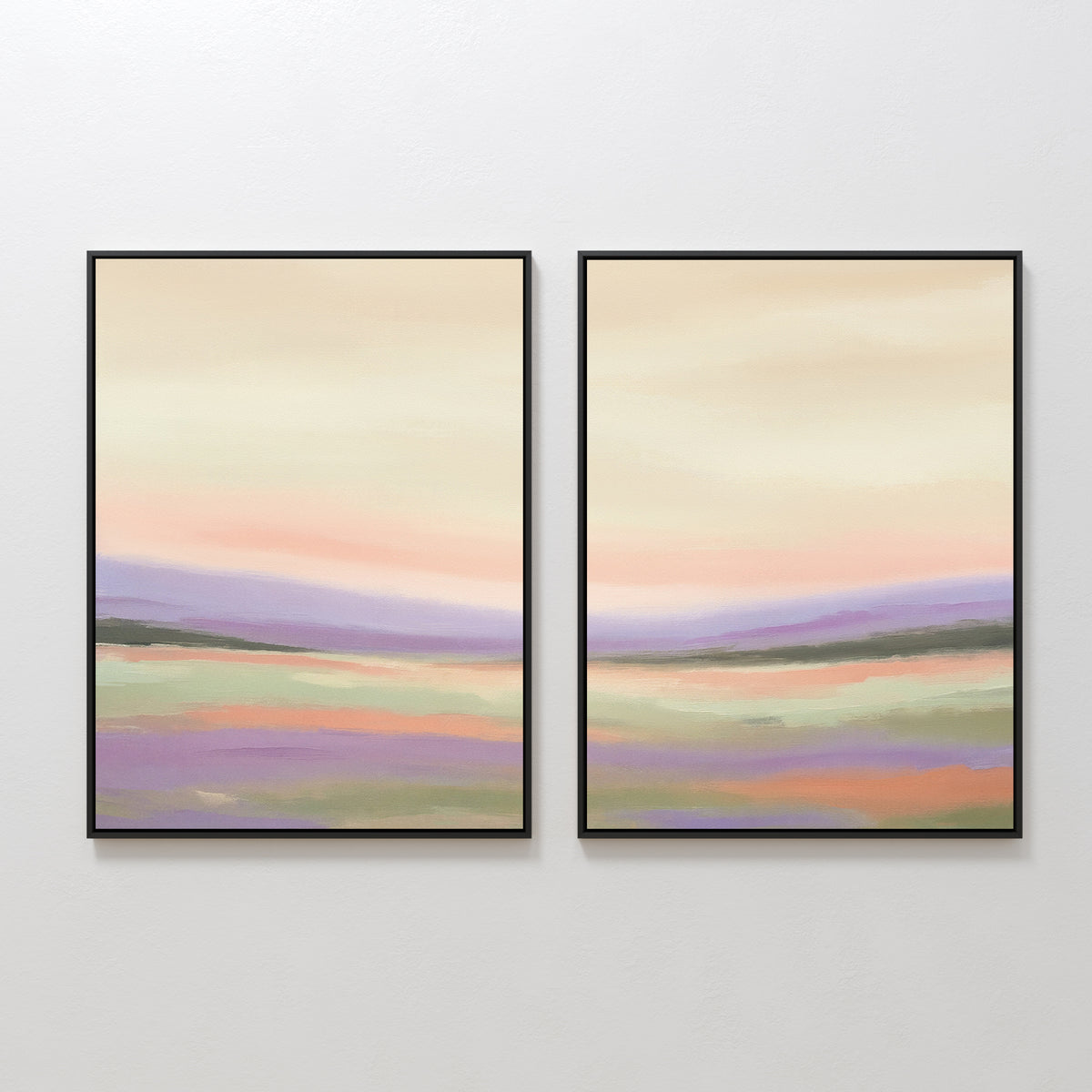 The Lavender Valley - Set Of 2 features framed abstract landscape prints with pastel peach, green, and purple bands. These Nordic Park-inspired artworks create a serene display when hung side by side on a white wall.
