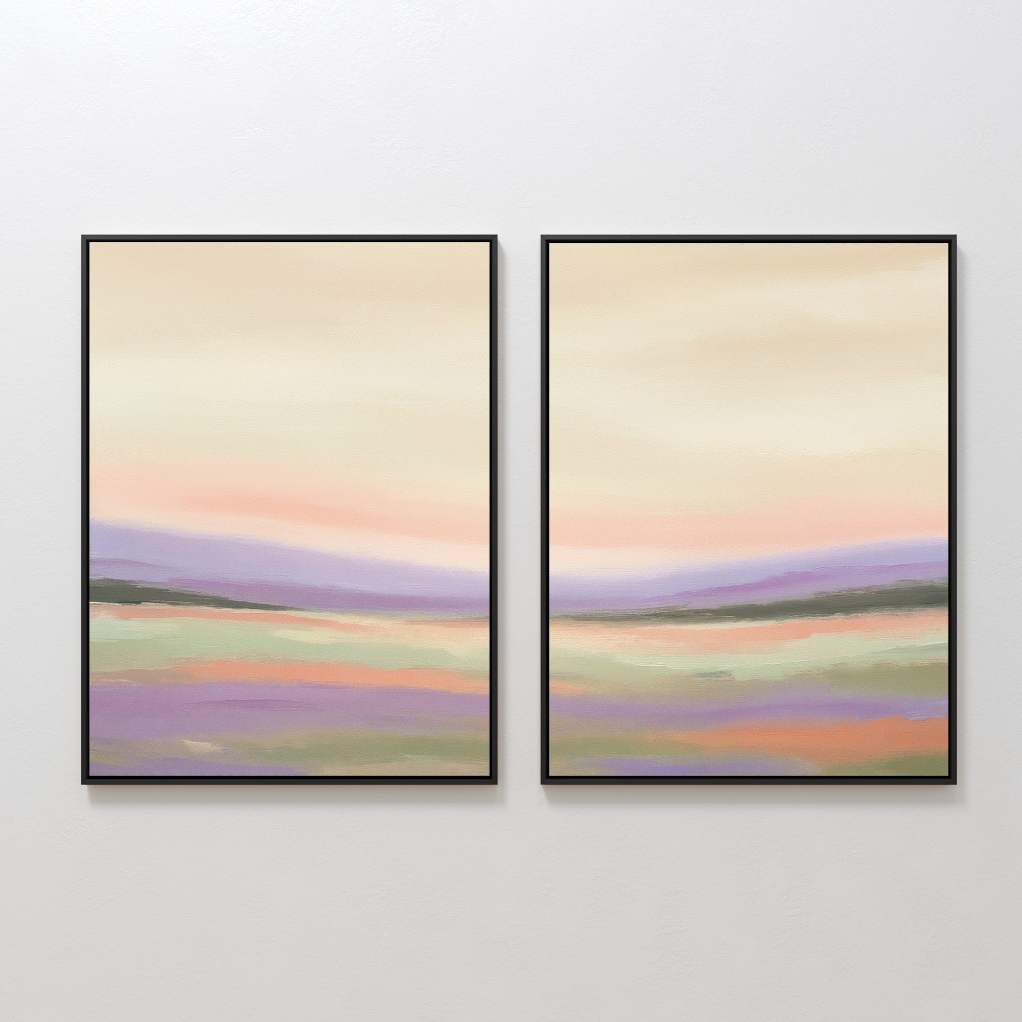 The Lavender Valley - Set Of 2 features framed abstract landscape prints with pastel peach, green, and purple bands. These Nordic Park-inspired artworks create a serene display when hung side by side on a white wall.