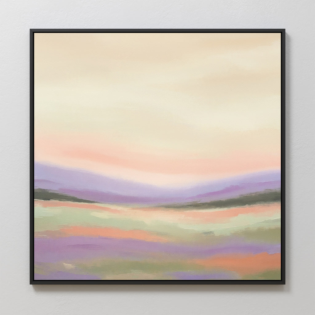 Lavender Valley Canvas Art - Square features a framed abstract landscape with soft pastels: a hazy cream and pink sky above purple, green, and orange hills. This serene wall art brings an impressionistic Nordic park feel to your space.