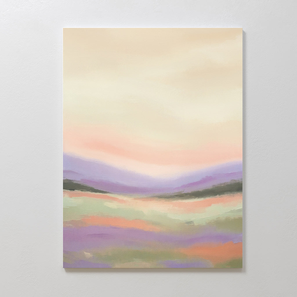 The Lavender Valley Canvas Art - Vertical features a pastel landscape of gentle lavender, peach, and green hills beneath a warm sky, creating a soft, serene scene perfect for hanging on a white wall.