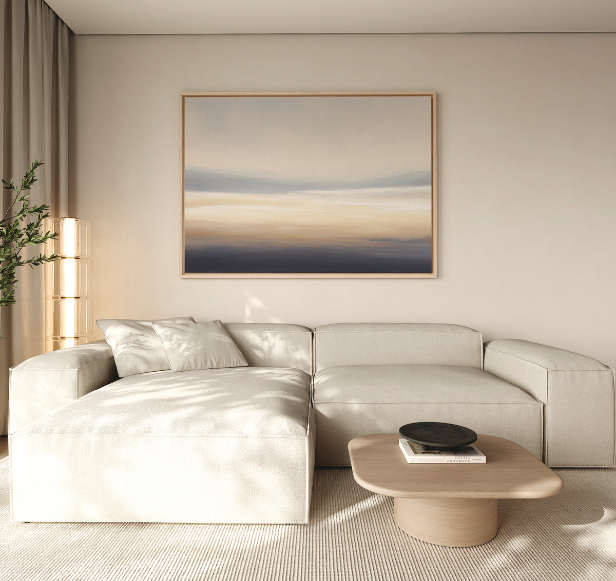 A modern living room with a light beige sectional sofa, wooden coffee table with a black bowl, neutral walls, sheer curtains, a tall plant in the corner, and calming "Layered Dusk Canvas Art - Horizontal" abstract wall art.