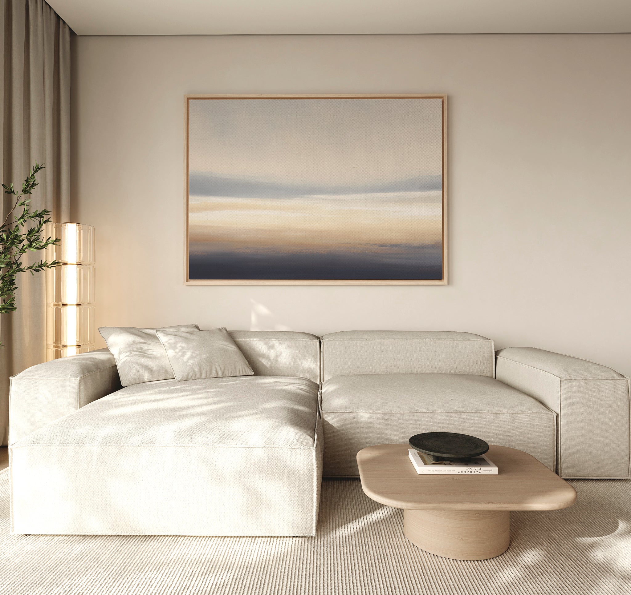 A modern living room with a light beige sectional sofa, wooden coffee table with a black bowl, neutral walls, sheer curtains, a tall plant in the corner, and calming "Layered Dusk Canvas Art - Horizontal" abstract wall art.