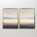 Layered Dusk - Set Of 2 features framed abstract wall art with soft blue, beige, and cream layers, evoking a tranquil sky or seascape—ideal for adding Nordic Park-inspired calm to any plain white wall.