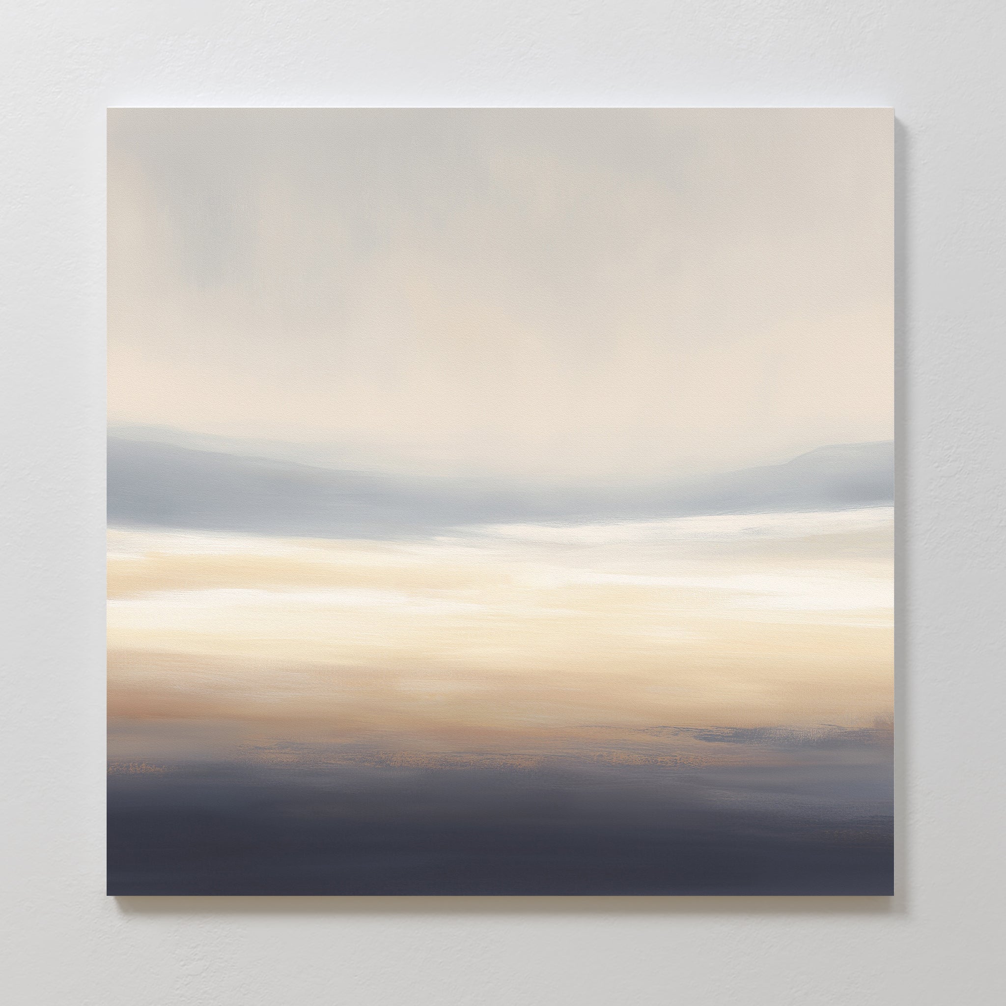 Layered Dusk Canvas Art - Square features soft, blended blue, beige, and white tones that evoke a serene, misty landscape. This calming print brings tranquil Nordic park-inspired decor to any plain wall.