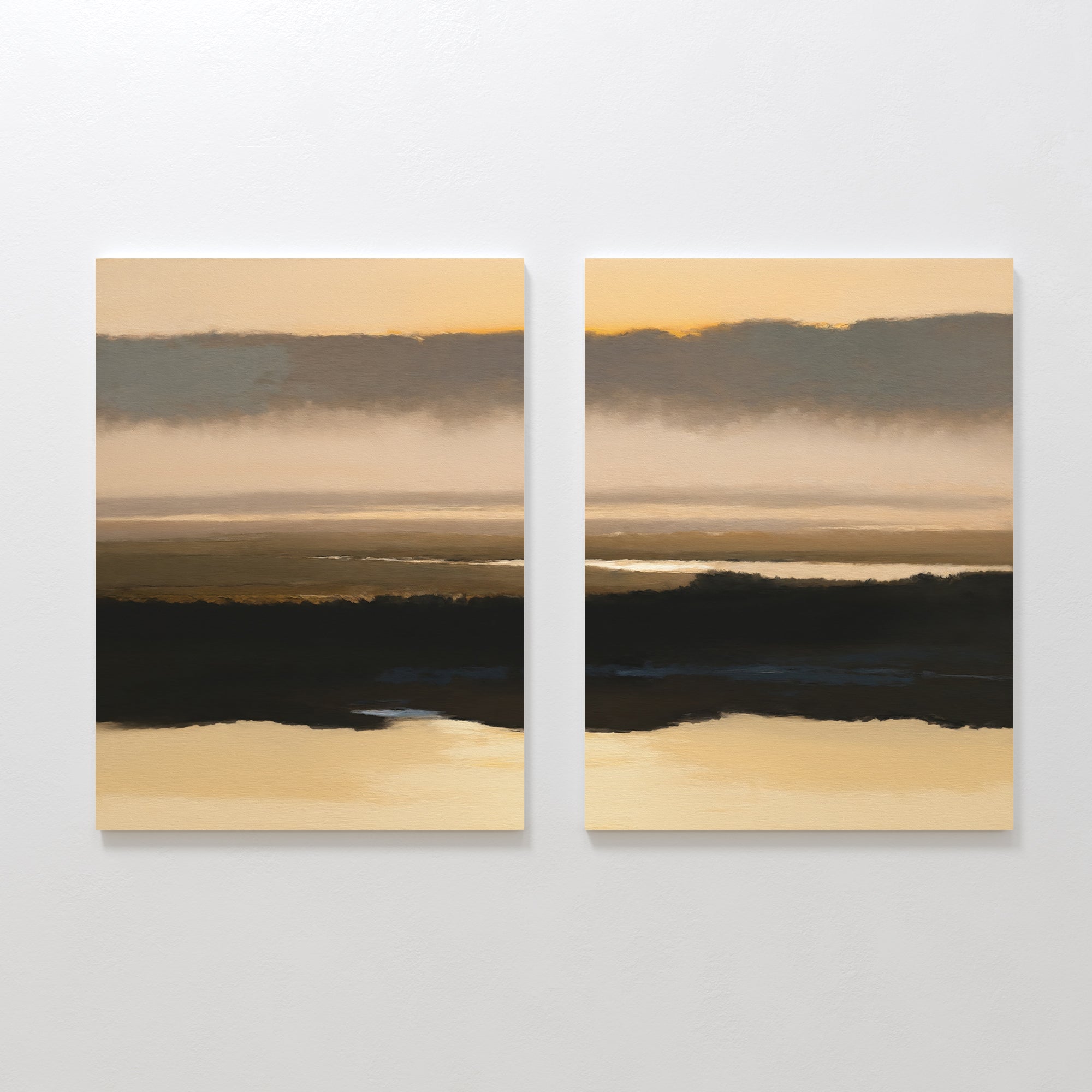 Layered Valley Dawn - Set Of 2 features two square canvas prints side by side, showing a serene landscape with reflective water, distant land, and a softly glowing sky with layered clouds in warm, muted tones for tranquil wall decor.