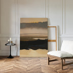 A modern space with herringbone wood floors, white paneled walls, a cushioned wooden chair, black round side table, and the tranquil Layered Valley Dawn Canvas Art - Vertical resting against the wall.