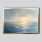 Luminous Calm Canvas Art - Horizontal features a tranquil sea at sunrise or sunset, with gentle blue waves reflecting soft sky light. The coastal colors evoke a peaceful, serene atmosphere, perfect for any relaxing space.
