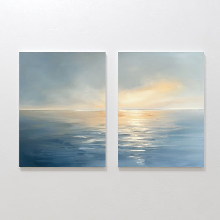 Luminous Calm - Set of 2 features two abstract canvas prints: one panel shines with warm golden sunlight on the calm ocean, while the other is cooler and more subdued, together creating a serene coastal atmosphere.