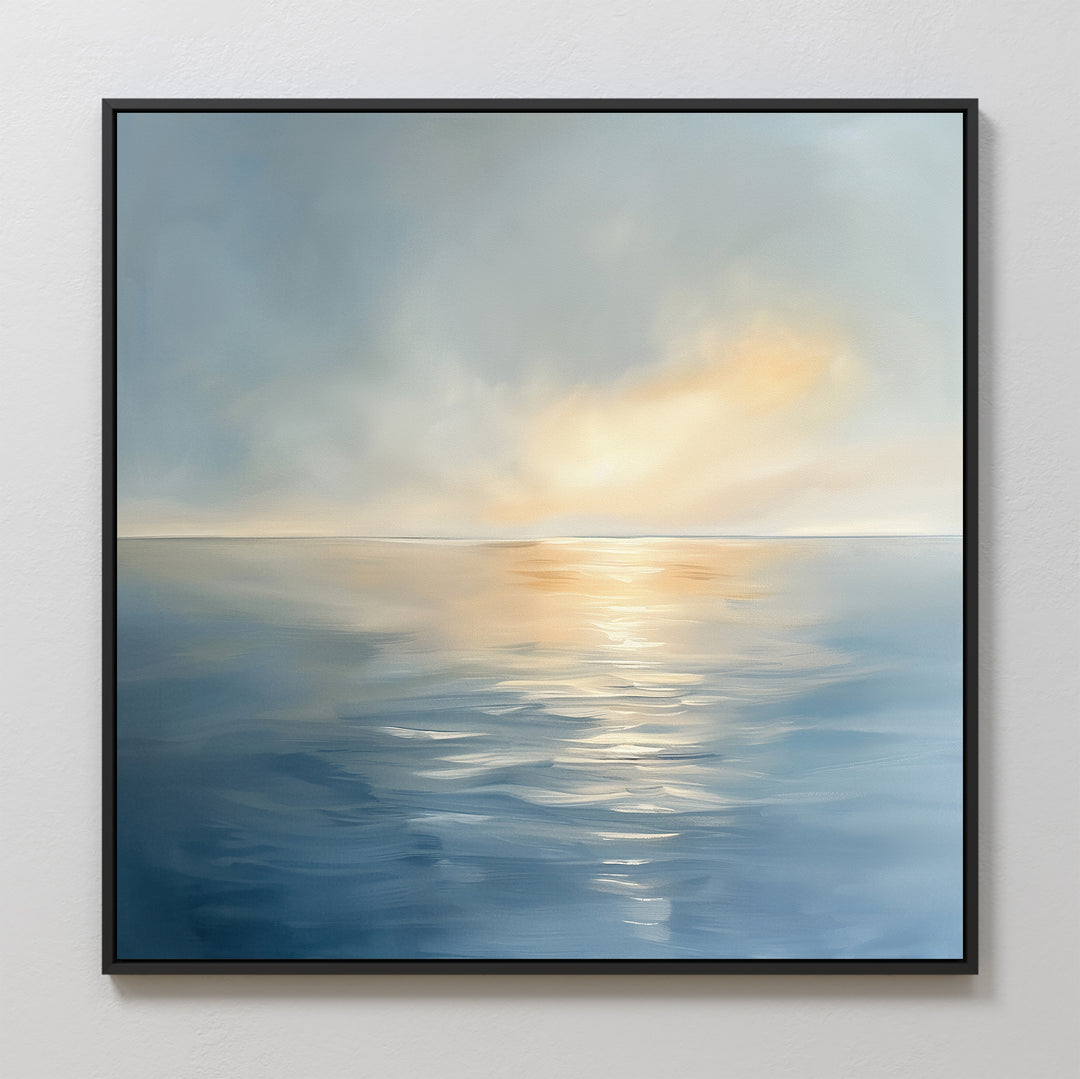 Luminous Calm Canvas Art - Square: A framed canvas print featuring a tranquil ocean with gentle ripples, reflecting soft pastel hues of sunrise or sunset in a serene coastal scene.