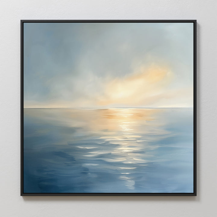 Luminous Calm Canvas Art - Square: A framed canvas print featuring a tranquil ocean with gentle ripples, reflecting soft pastel hues of sunrise or sunset in a serene coastal scene.