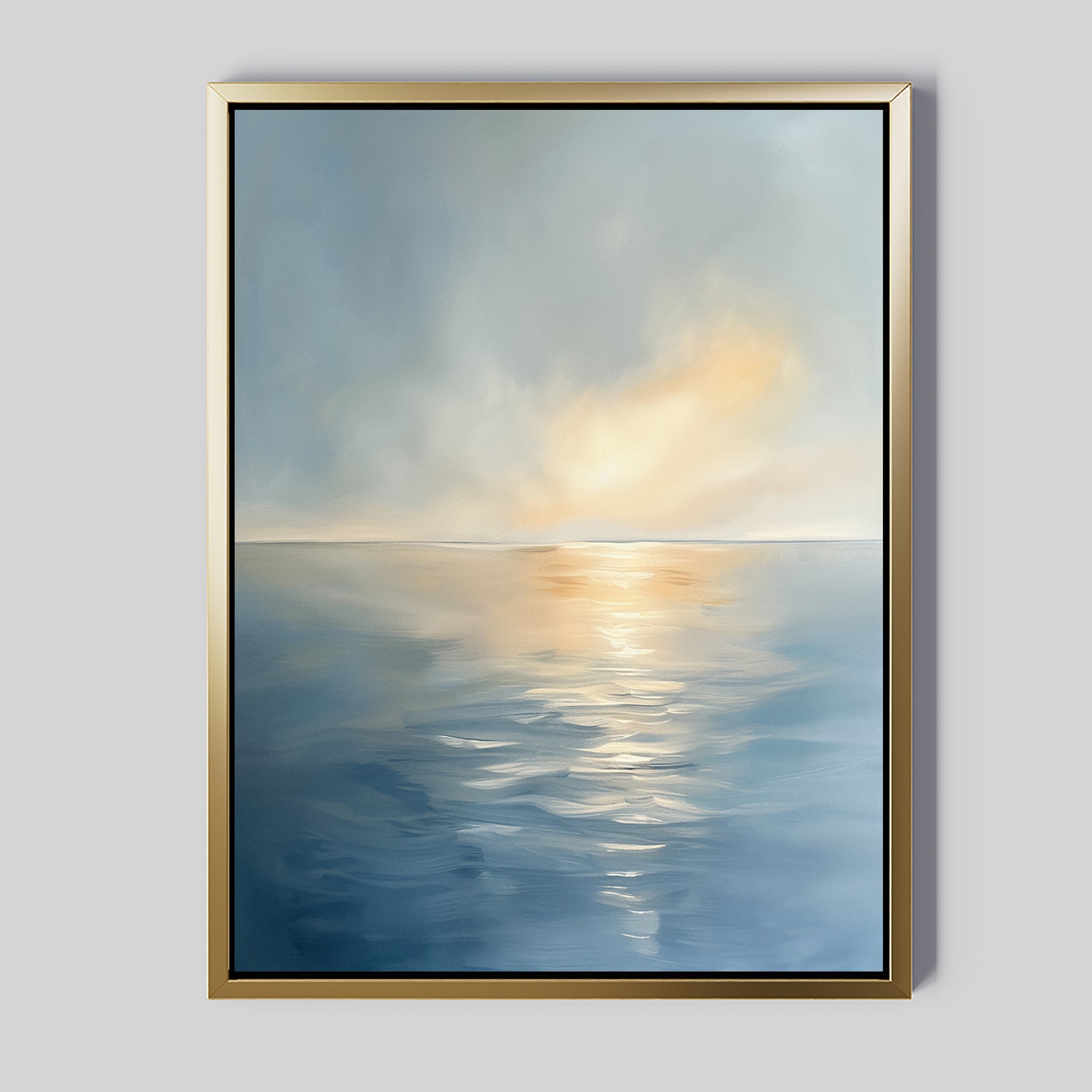The Luminous Calm Canvas Art - Vertical, showcasing serene blue waters and golden sunset hues beneath a cloudy sky, brings soothing coastal elegance to a light gray wall.