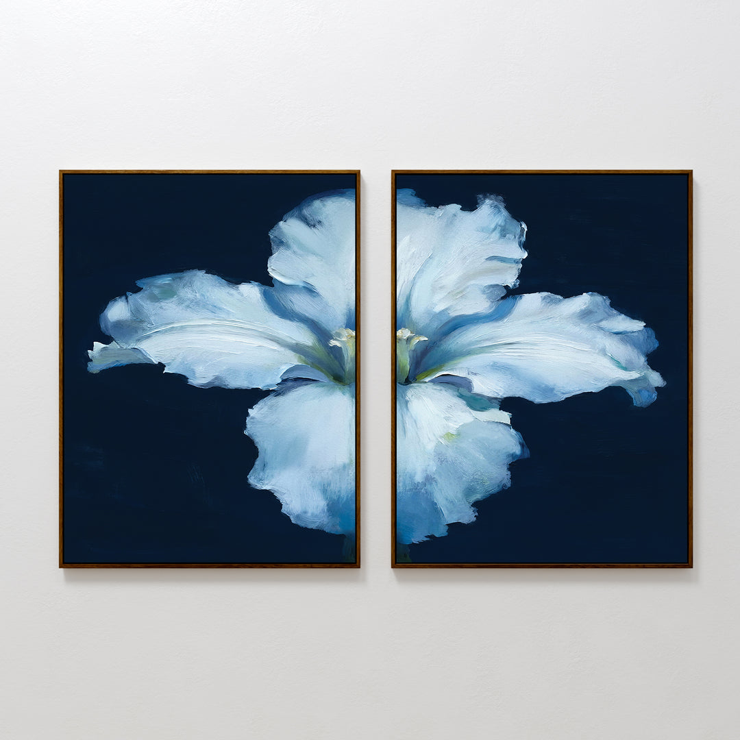 The Luminous Iris - Set of 2 features two framed canvas prints that together form a radiant iris with soft petals on a dark blue background, ideal for adding cohesion to any Nordic Park-inspired decor.