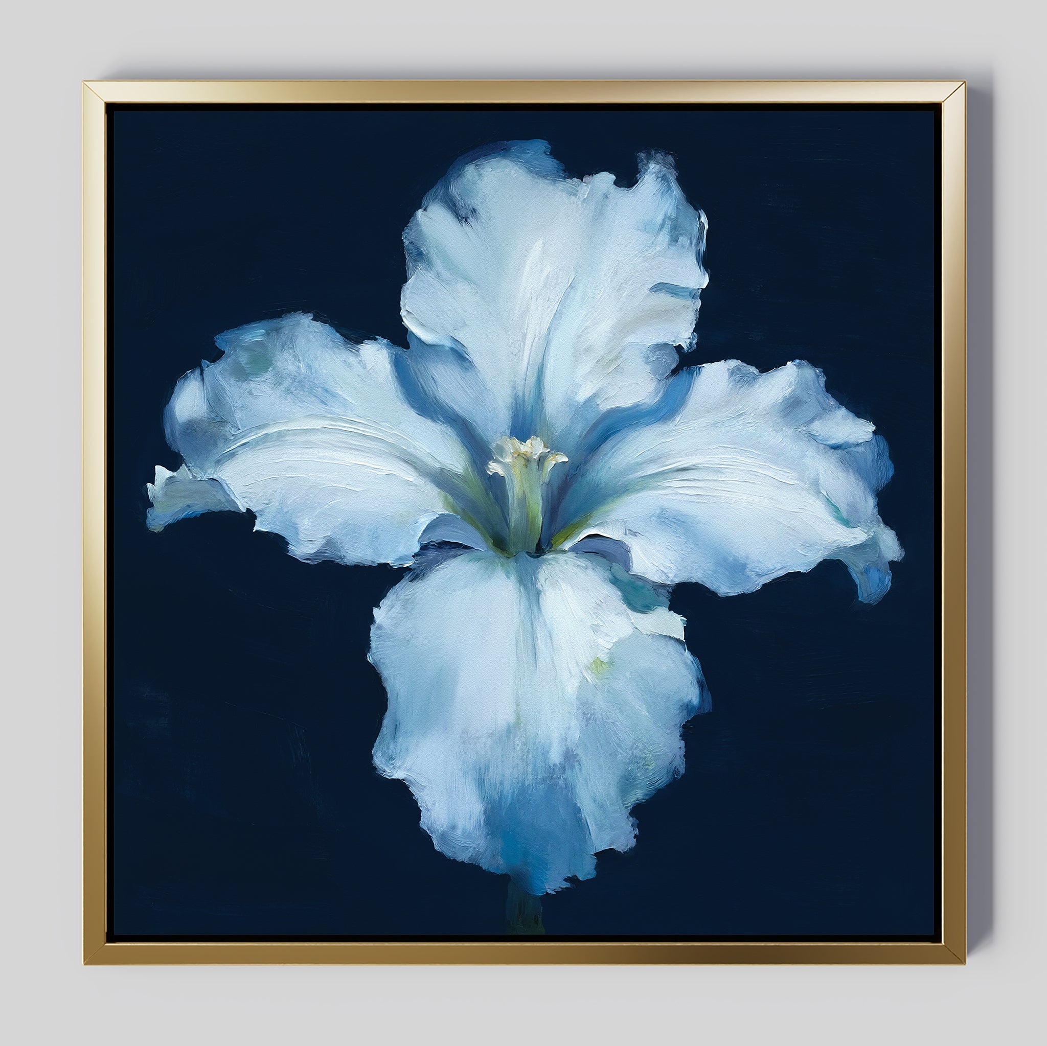 The Luminous Iris Canvas Art – Square features a luminous iris with soft blue hues on a dark blue background. A simple gold frame adds modern Nordic Park elegance, making it a stylish statement piece for any space.