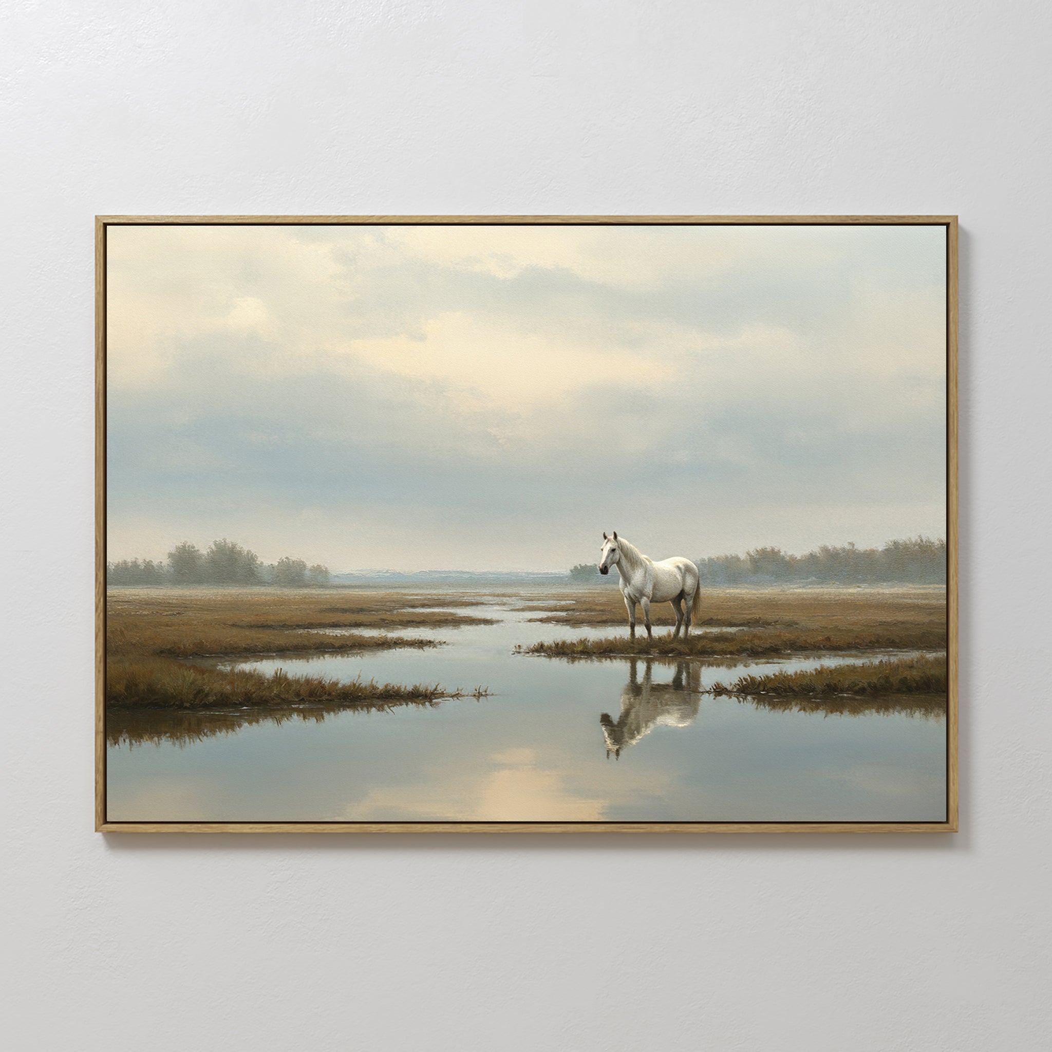 Marsh Reflection Canvas Art - Horizontal: This framed landscape print features a serene white horse standing in a calm marsh, its reflection mirrored in the water beneath cloudy skies, evoking the tranquility of a Nordic park.