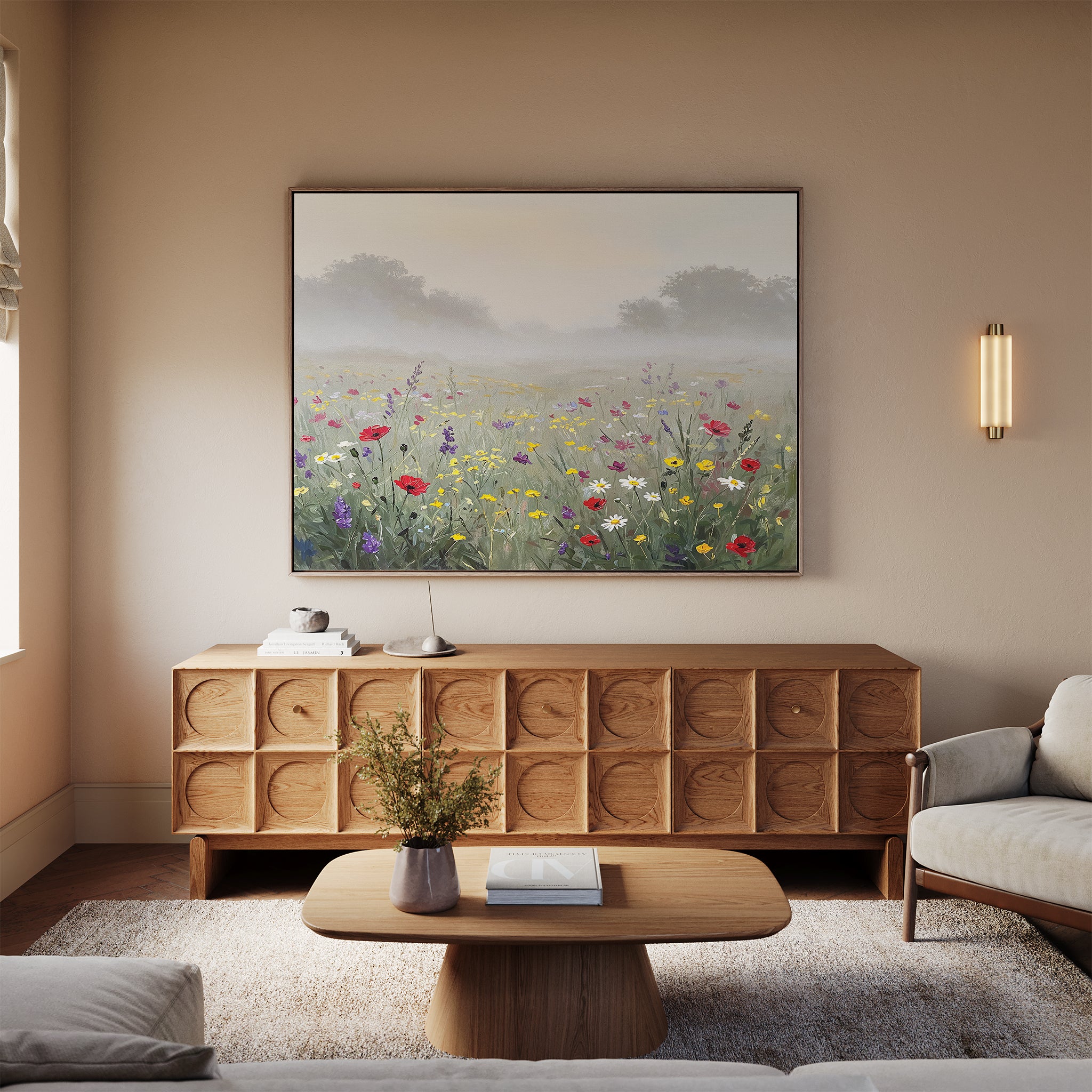 A cozy living room with a light wood sideboard, matching coffee table, beige sofa, and the Meadow Dreams Canvas Art - Horizontal hanging above the sideboard. Soft lighting and neutral tones create a calm Nordic Park-inspired atmosphere.