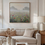 A cozy living room features a white sofa with beige cushions, a side table and lamp, dried flowers in a vase, and Meadow Dreams Canvas Art - Square above the sofa, bringing serene Nordic-inspired beauty to the space.