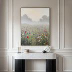 The Meadow Dreams Canvas Art - Vertical hangs on a light gray wall above a marble console, elegantly styled with candles, boxes, and a white ceramic vase, adding serene Nordic Park charm to the space.