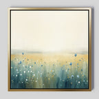 Meadow Whispers Canvas Art - Square: A framed impressionistic landscape featuring delicate blue, white, and yellow wildflowers in the foreground, with soft golden grass and a misty pale sky fading into the background.