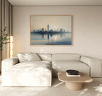 A modern living room with a white sectional sofa, light wood coffee table, potted plant, floor lamp, and the Metropolitan Dawn Canvas Art - Horizontal adding urban tranquility above the sofa.