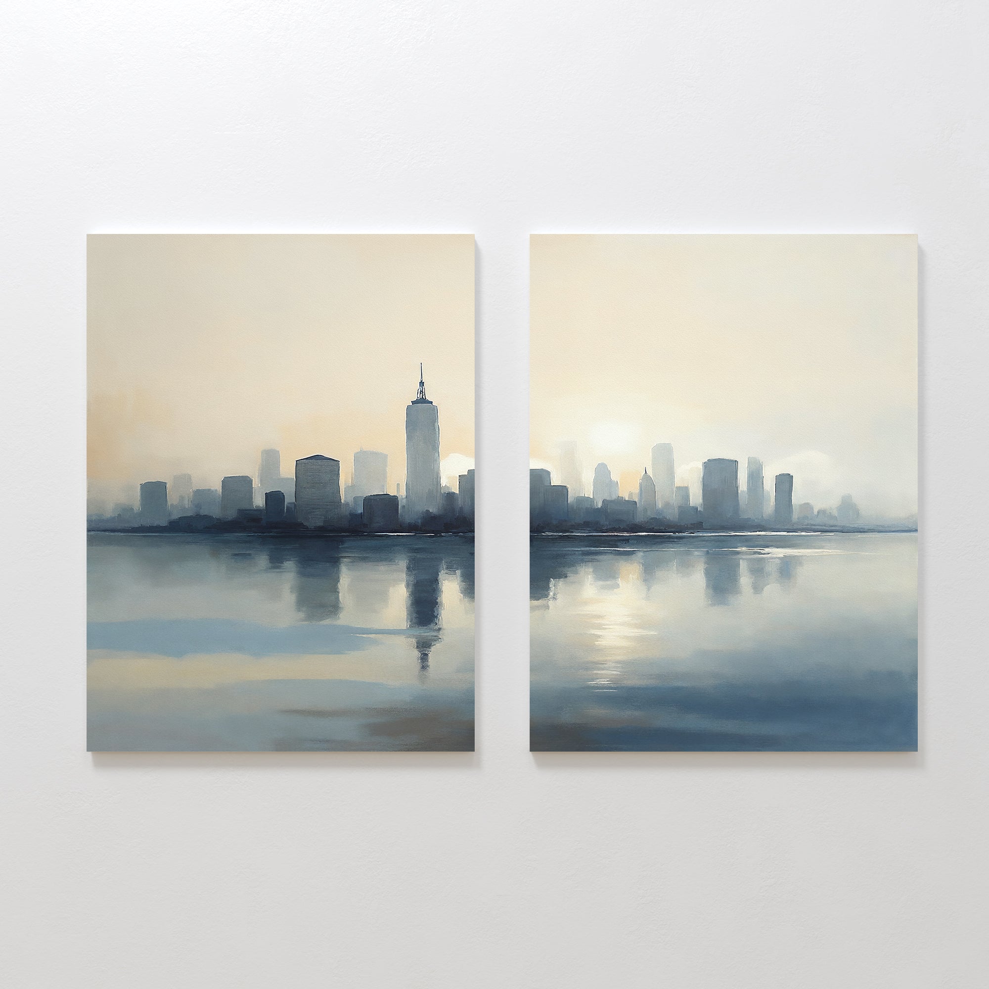 Metropolitan Dawn - Set of 2 are minimalist canvas prints featuring a city skyline and tall buildings reflected in calm water, rendered in soft blue, gray, and beige tones on a light backdrop for an urban tranquility.