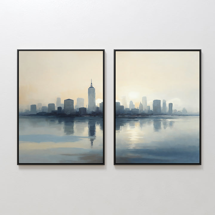 The Metropolitan Dawn - Set of 2 features framed canvas prints with hazy city skylines reflected in calm water. Soft blue and beige tones evoke urban tranquility, adding a serene, minimalist touch to your space.