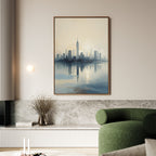 A modern living room featuring a green couch, round wall light, stone shelf with a vase of dried branches, and the large Metropolitan Dawn Canvas Art - Vertical displaying city skyline art reflected on water.