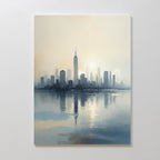 The Metropolitan Dawn Canvas Art - Vertical features a serene city skyline at sunrise with tall buildings mirrored on calm water, rendered in soft blue, gray, and beige—ideal urban tranquility artwork for any space.