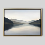 Mirror Valley Canvas Art - Horizontal features a tranquil lake reflecting distant hills and a soft, cloudy sky in calming natural tones—an ideal piece of Nordic Park-inspired wall art to bring serenity to any space.