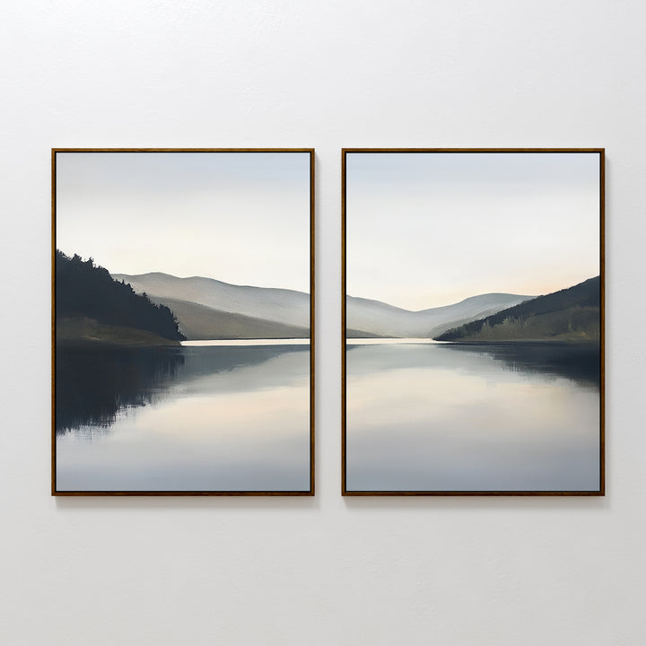 The Mirror Valley - Set of 2 features framed canvas prints, each showing a calm lake and distant mountains beneath a misty sky, creating a serene Nordic-inspired landscape across both frames.