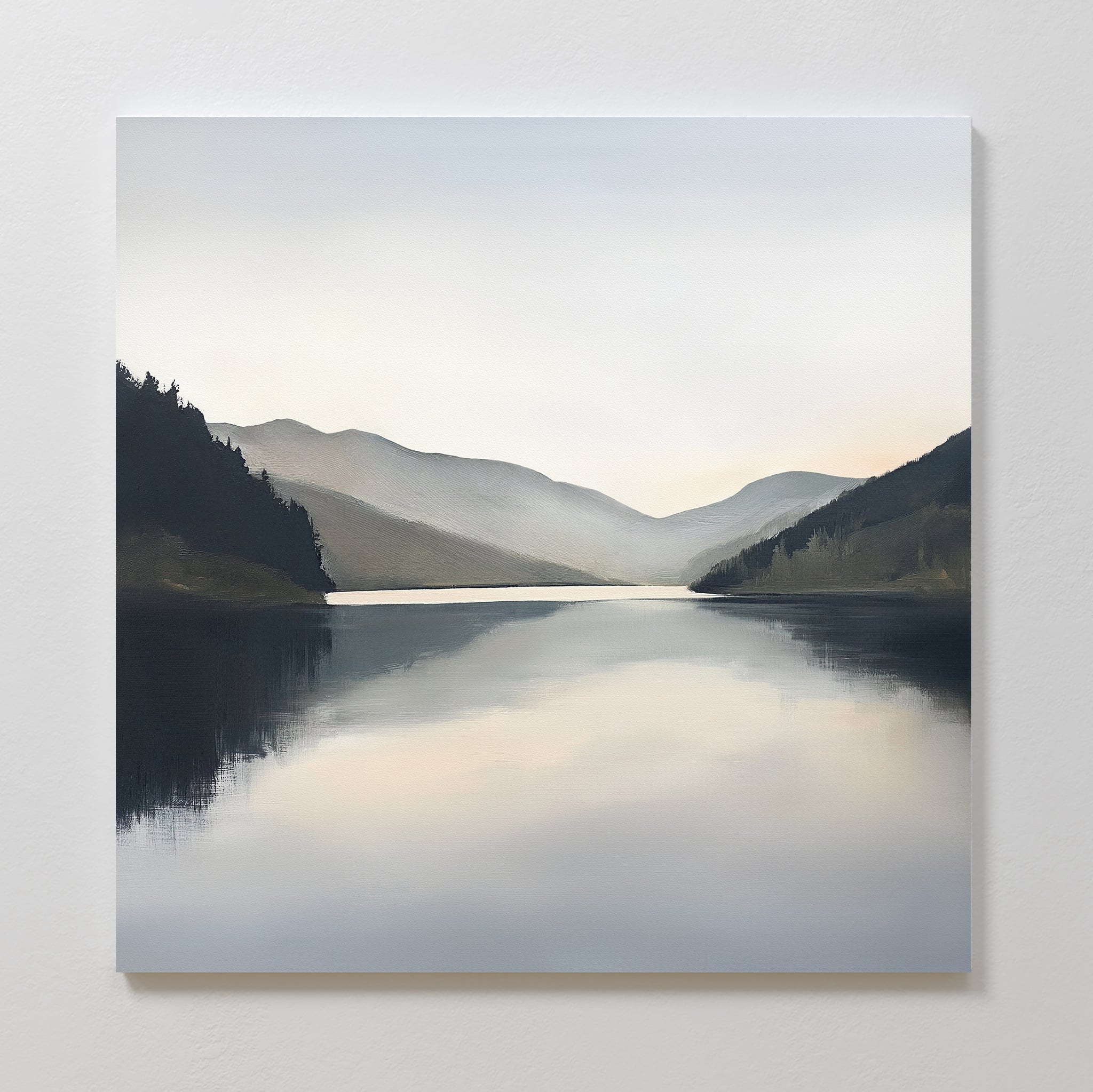 Mirror Valley Canvas Art - Square features a tranquil lake with smooth reflections, misty mountains, and tree-lined hills under a soft sky—perfect wall art for creating a serene, Nordic-inspired atmosphere.