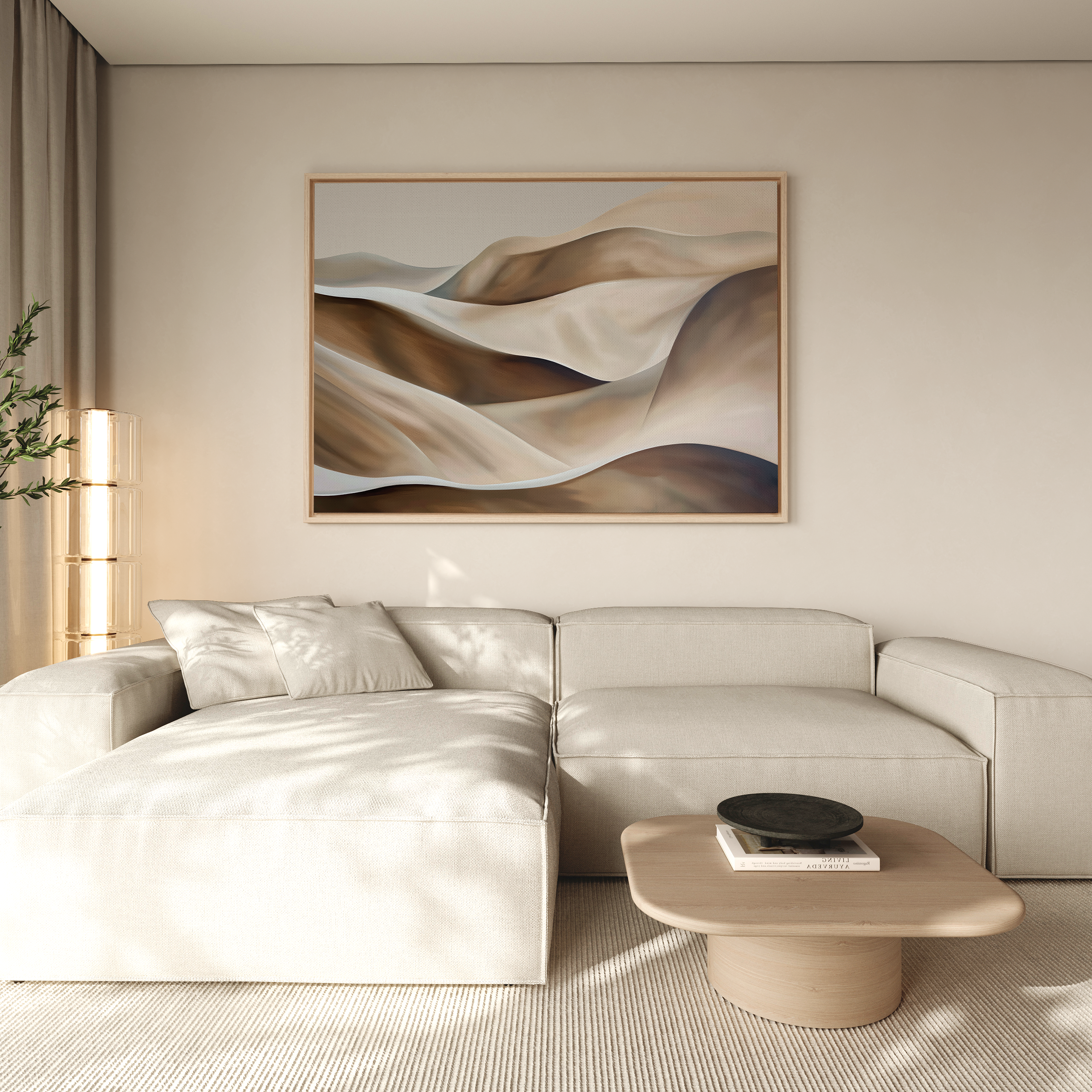 A modern living room with a light beige sectional, low wooden coffee table, neutral walls, and soft natural light. Minimalist wall art—Desert Waves Abstract Canvas Art—of sand dunes hangs above, creating a serene atmosphere.