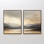 Mountain Reverie - Set of 2 features framed watercolor prints of misty mountains and a tranquil lake under cloudy skies in soft neutral tones, creating peaceful Nordic park-inspired wall art.