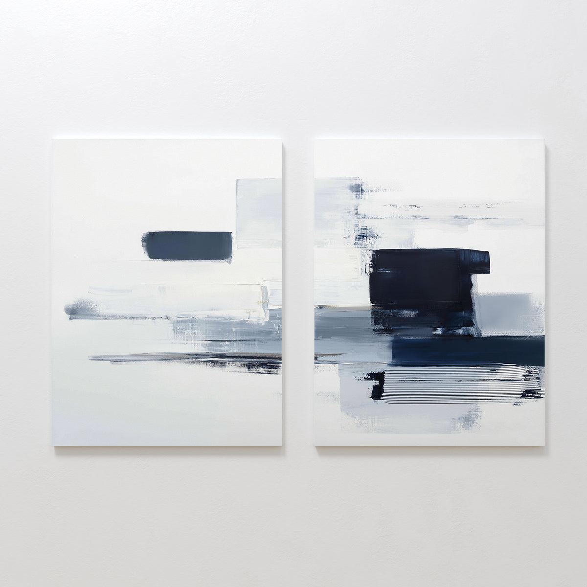 Navy Brushwork - Set Of 2: Modern geometric prints with bold white, gray, and navy brushstrokes. This minimalist wall art set adds striking abstract style to contemporary or minimalist home decor.