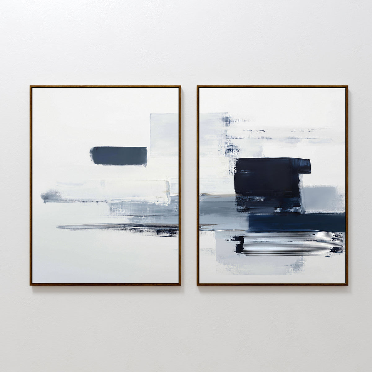 Navy Brushwork - Set Of 2: Modern, minimalist framed wall art with bold blue, black, and white brushstrokes. Perfect for adding a contemporary touch to any minimalist space or plain white wall.